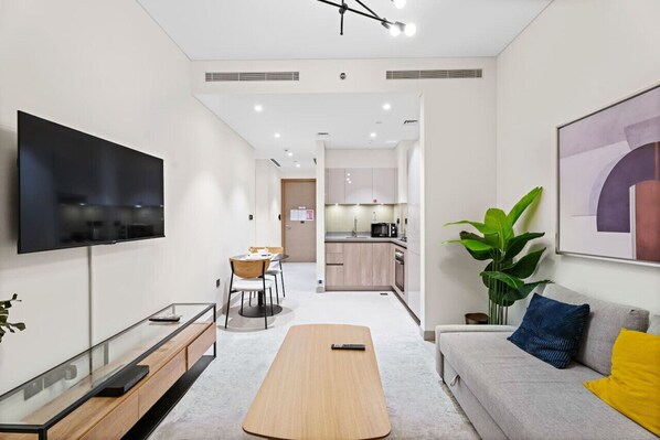 Living Room: Experience modern elegance with bright spaces and a stylish kitchen setup!