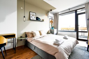 #SofiaSharedCharm
#CityscapeTerraceViews
#PastelRetreatSofia
#SharedLuxuryLiving
#CozyCommunalExperience
