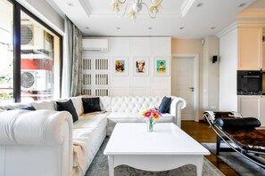 Sleek sophistication: Enjoy the blend of modern aesthetics and comfort that our living room provides, perfect for any occasion.