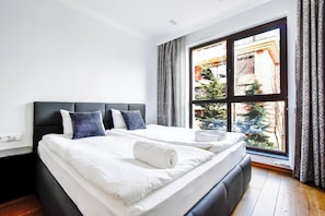Cozy and contemporary: Bedroom 2 offers a blend of modern style and unmatched comfort with a focus on restful sleep.