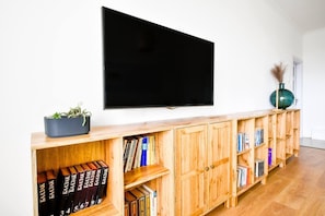 You’ll kick back and catch up on your favorite shows on the large flat-screen TV. Settle in and make movie nights a part of your stay.