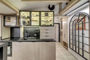 Cook up a storm or enjoy a quiet coffee – this kitchen has it all. ☕ Reserve Your Culinary Escape!