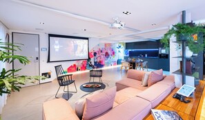 Gigantic 108" screen and loft style living