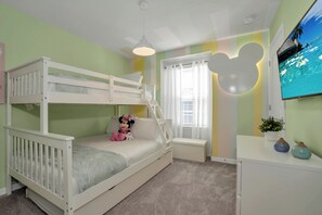 Mickey Mouse themed bedroom of the townhouse in Davenport Florida - Double and single bed bunk beds - Mickey mouse style decor that complements the space - Let's get into the world of Disney Magic with Mickey!