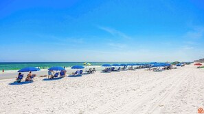 Bury your toes in the sand, your worries in the waves.