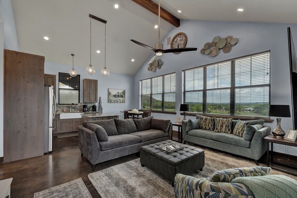 Bask in the natural light in the spacious living room.