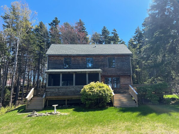 This beautiful log home is perched perfectly above the Atlantic Coast.