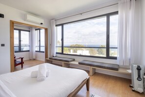 Spacious bedroom with panoramic window
