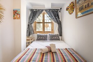 Spacious Bedroom: Relax in comfort with a king-sized bed
