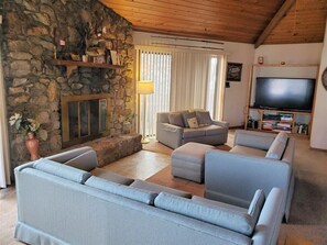 Upstairs: Living Room with pullout Twin sleeper, gas fireplace, cable tv and DVD/VHS player