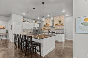 Island with bar seating.
