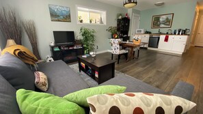 Open-concept living room, dining room, and kitchenette