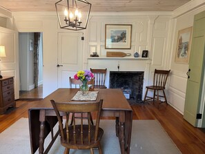 240+ year old fireplace in dining room.