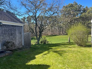 Outdoor shower at right.