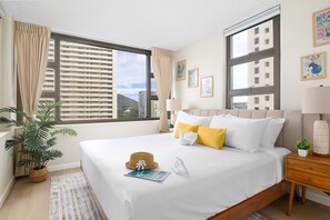 Have a restful night's sleep in your bedroom with a king-size bed and mountain view.