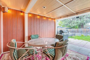 Covered Patio | Gas Grill | Outdoor Dining Area | Fenced Backyard