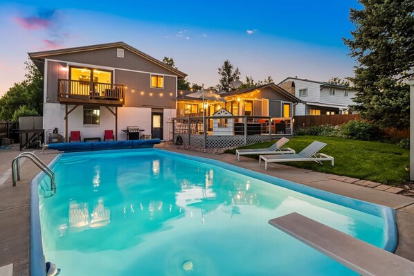 Outdoor pool with lounge chairs available in Summer May thru Sep.