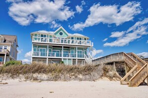 Beachfront house offering stunning ocean views and direct beach access via public beach access