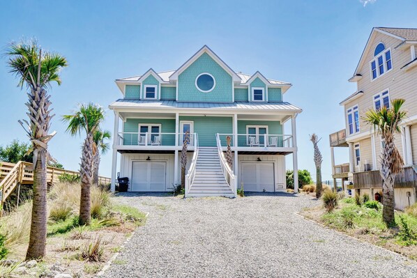A beautiful, light blue stilt house