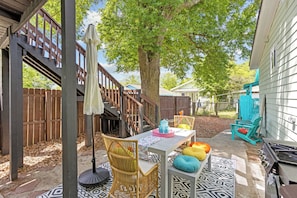 Outdoor patio backyard with vibrant outdoor furniture