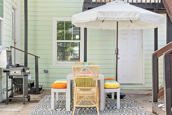 Patio with bbq grill and outdoor dining area