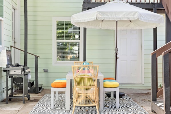 Patio with bbq grill and outdoor dining area
