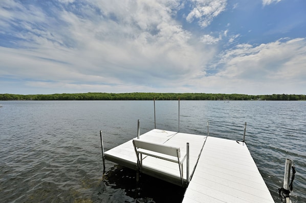 Clear water with a sandy bottom and an excellent dock area for your boat