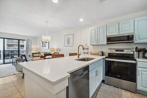 Kitchen with stainless steel appliances.