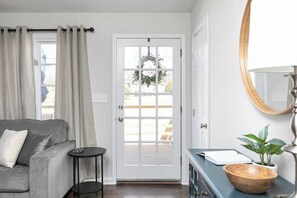 Bask in a sun-soaked living area with large windows that bring the outside in!