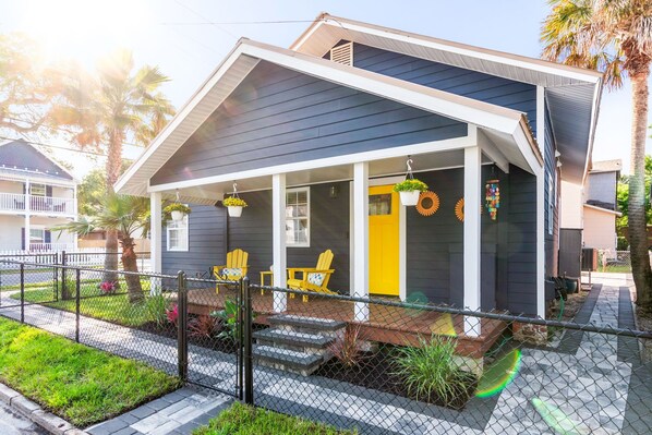 Start your stay with a deep breath and cold drink on this sunny costal porch.