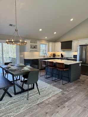 Kitchen and Dining area are great for Family/Group meals! Kitchen is stacked with cooking and baking basics!