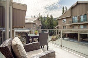 Main level patio with seating and BBQ