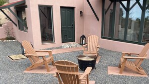 Outdoor fire pit seats 4.  Pellets available for an extra fee.
