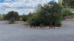 Ample parking in front of the home with an “exit loop” back to main entry.