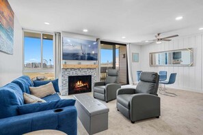 Cozy up by the custom tile fireplace in our spacious living room during those chilly months
