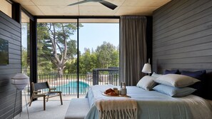 Master bedroom with stunning ensuite and pool views 
