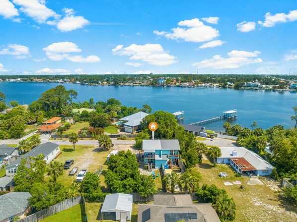 Nestled serenely by the bay, the property offers a tranquil retreat with stunning waterfront views.