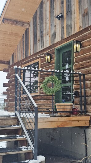 Festive entrance with heated snow mats in the winter for easy access.
