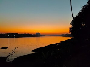 The setting sun from the river banks