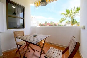 Terrace facing west with outdoor dining area for two guests