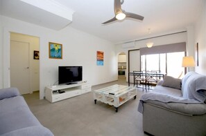 Bright lounge area with comfortable seating and air conditioning