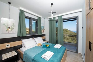 Main villa first floor bedroom with an en-suite bathroom