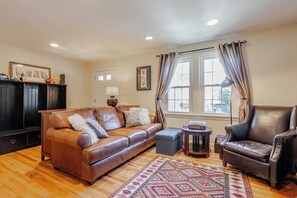 Bright and inviting space with leather seating and artful decor to unwind and relax!