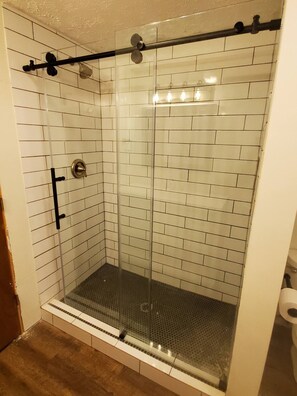 Upstairs Full Bath with small washer and dryer