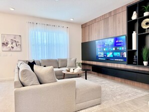 Spacious 8-seater sofa, Samsung Smart TV 75