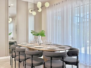 Expansive and elegant dining table, seats 10 comfortably.