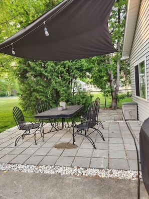 Back yard with a dining table to have a grill out with your family