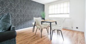 Charming small dining table, ideal for cozy meals and intimate gatherings.