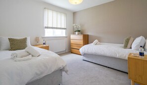 Cozy bedroom retreat, designed for restful nights and peaceful mornings.