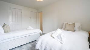Cozy bedroom retreat, designed for restful nights and peaceful mornings.